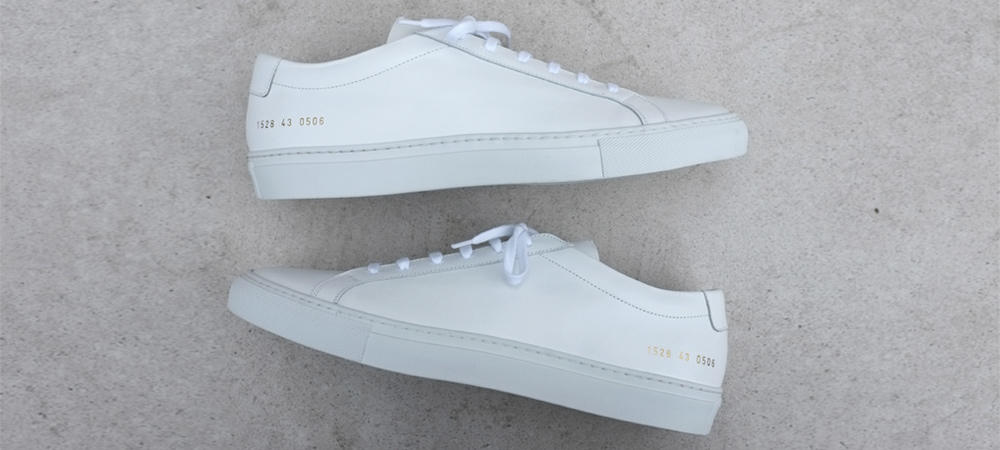 white shoes like common projects
