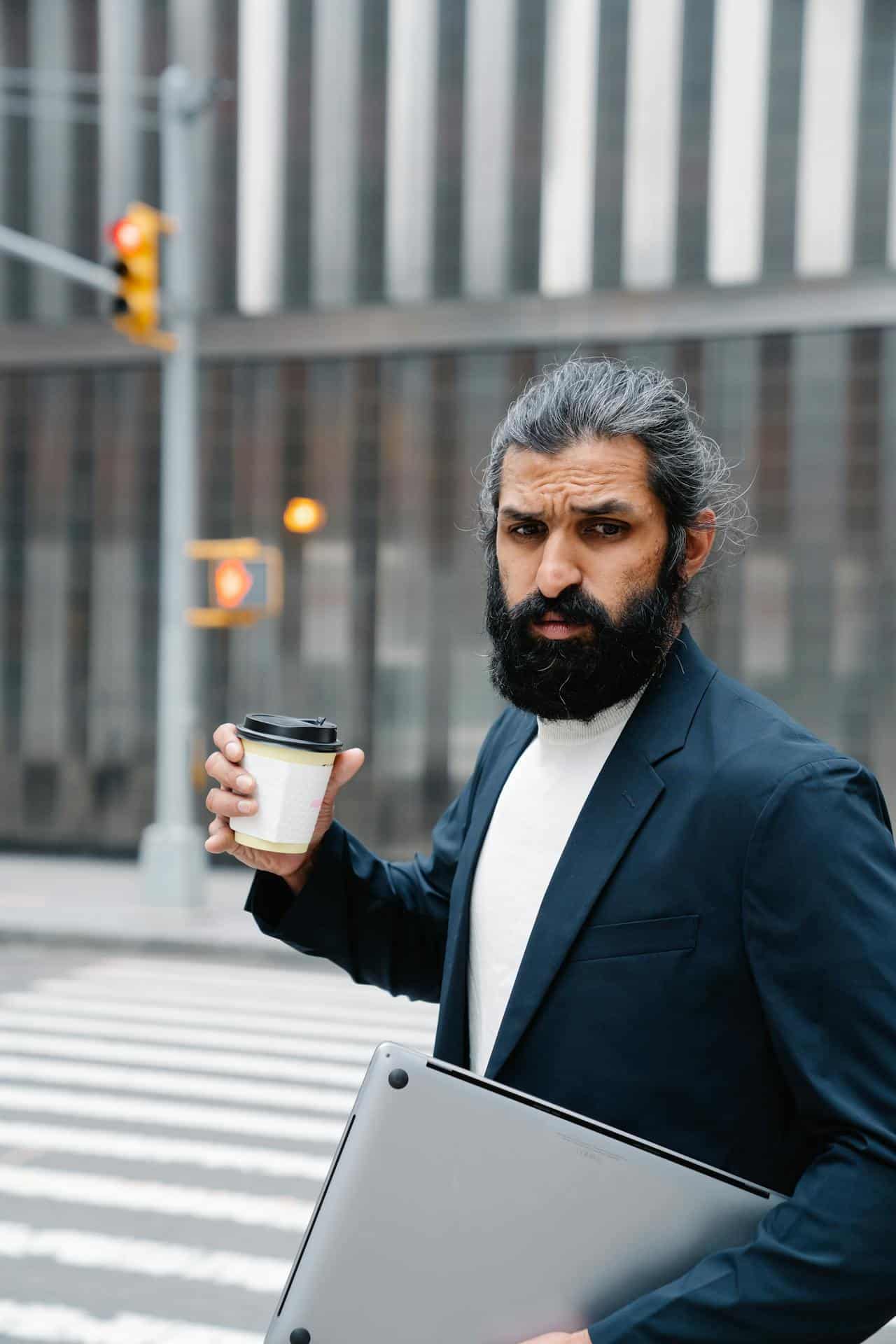 Man holding Cup of Coffee