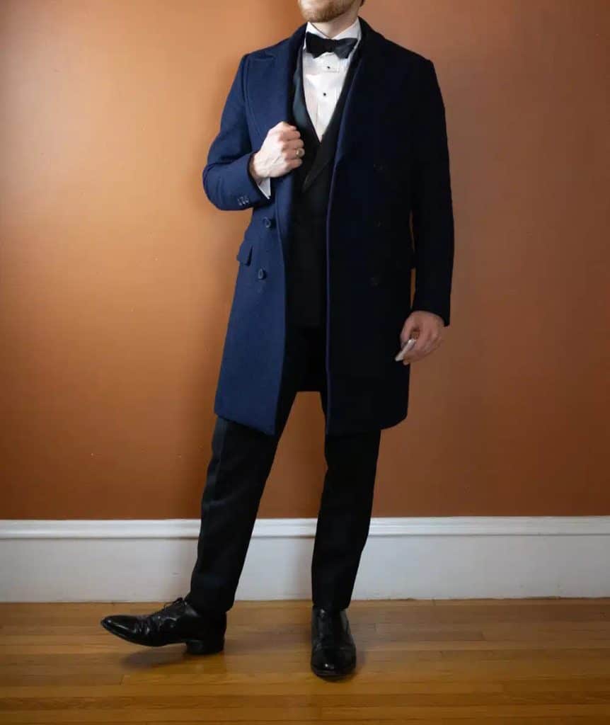 Wearing an overcoat over a tuxedo